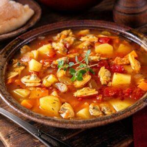 Large bowl of Manhattan clam chowder.