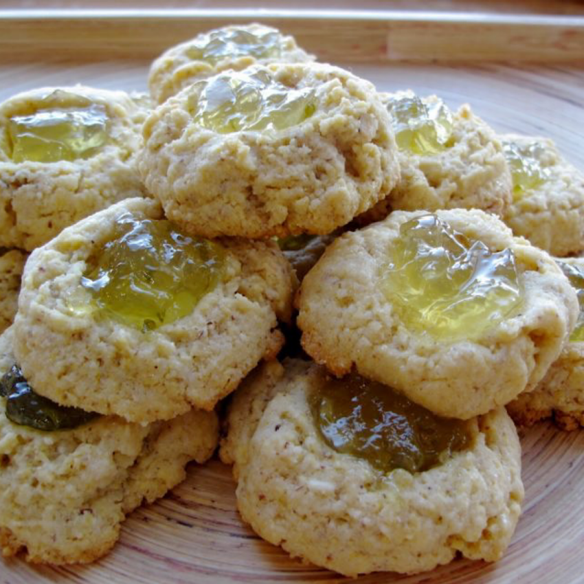 Polenta Thumbprint cookies with lime jelly filling.