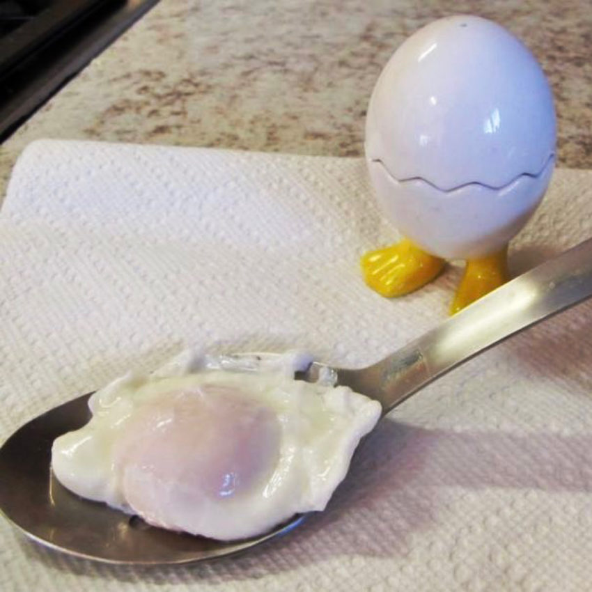 Perfect poached egg on a spoon.