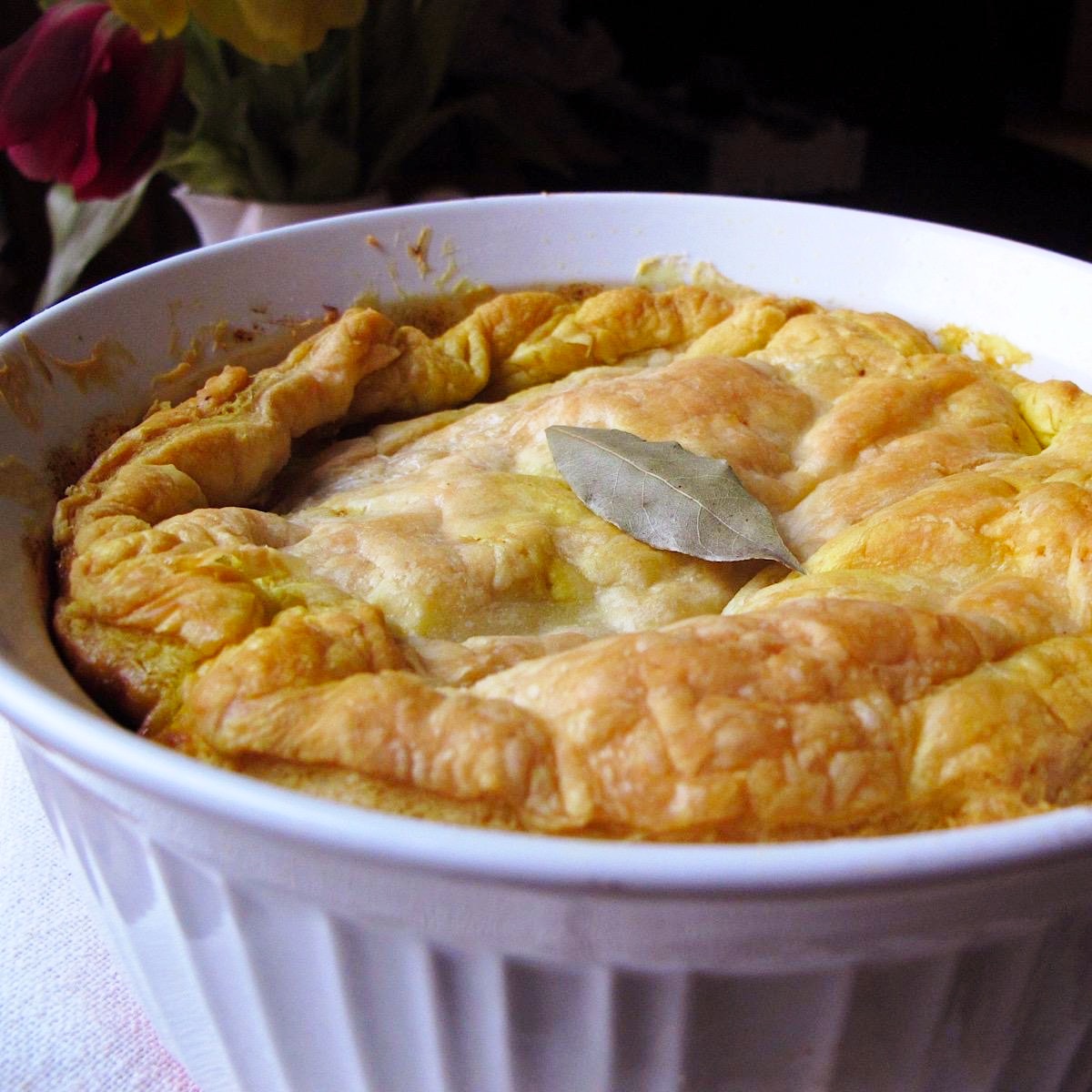 South African meat pie (bobotie) with puff pastry crust