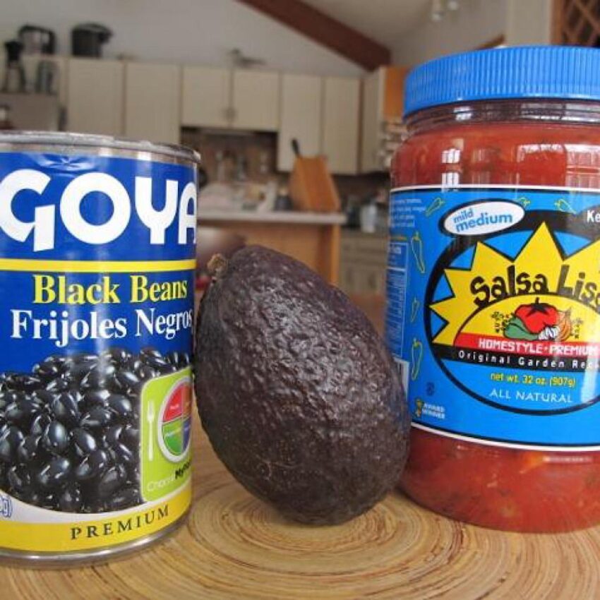 Ingredients for a quick slow carb lunch of beans, avocado and salsa