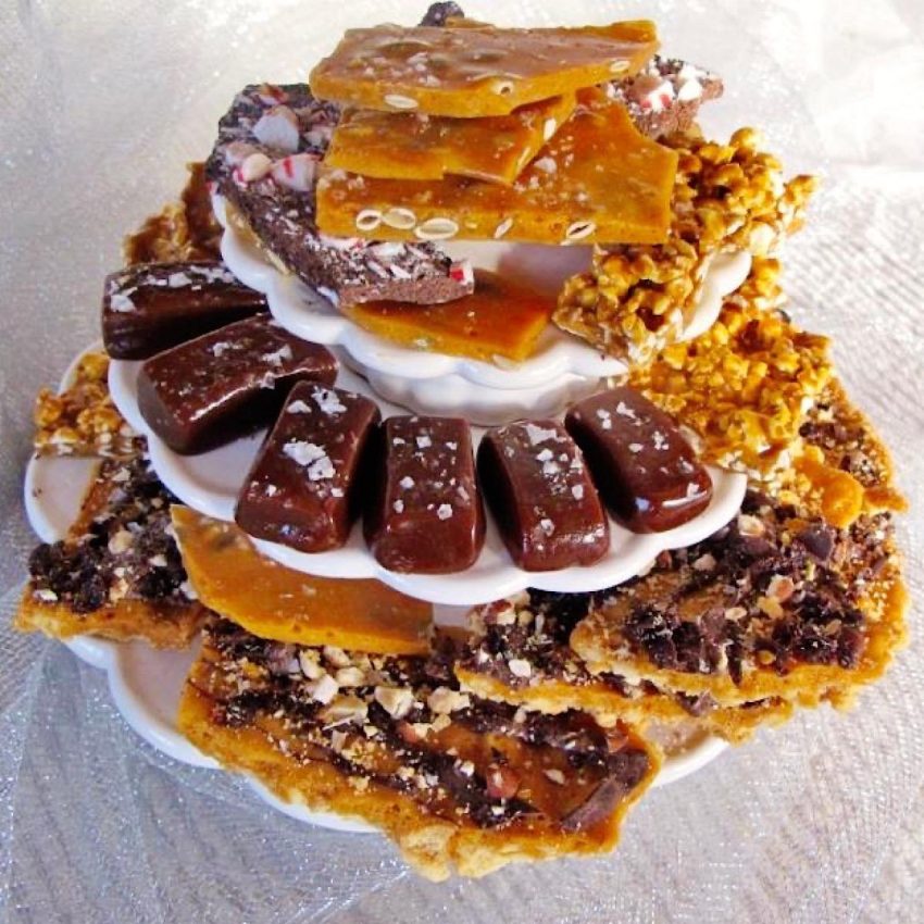 Peanut brittle, chocolate bark and bourbon caramels on a tiered candy dish