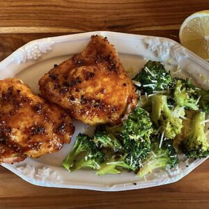 Sticky Asian chicken thighs with roasted broccoli