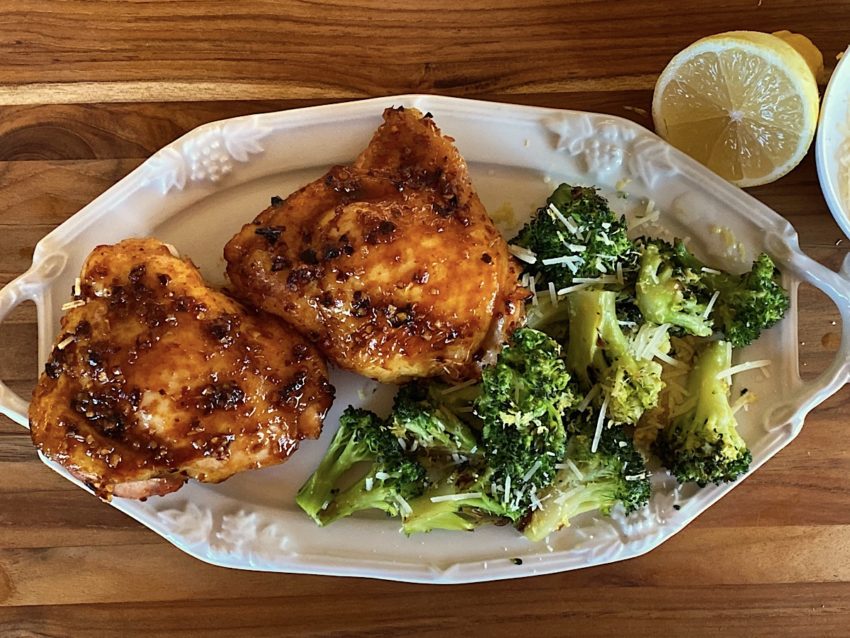 Sticky Asian chicken thighs with roasted broccoli