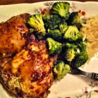 Chicken dinner of Asian chicken thighs and broccoli and orzo