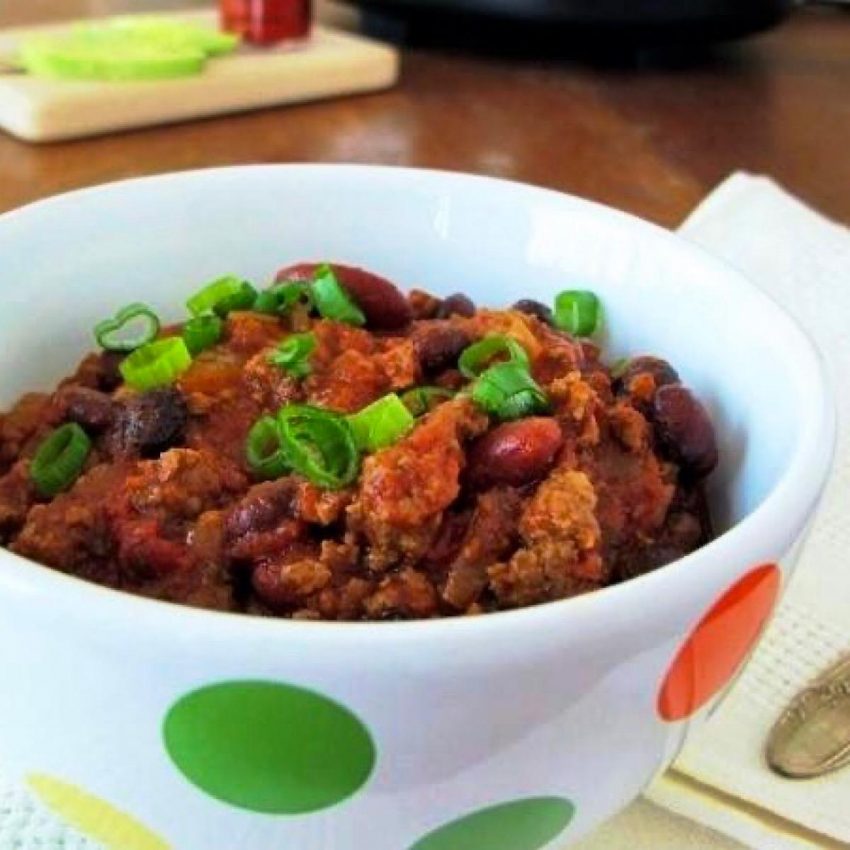 Bowl of slow carb chili with beans, beef and tomatoes