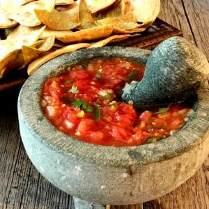 Salsa rojo made in a molcajete (mortar and pestle).