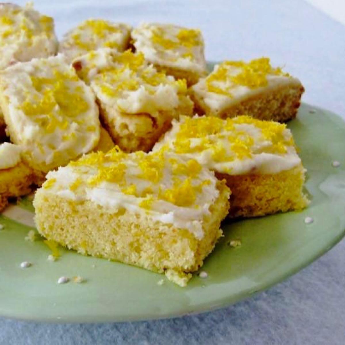 Plate of lemon blondies with Limoncello Icing