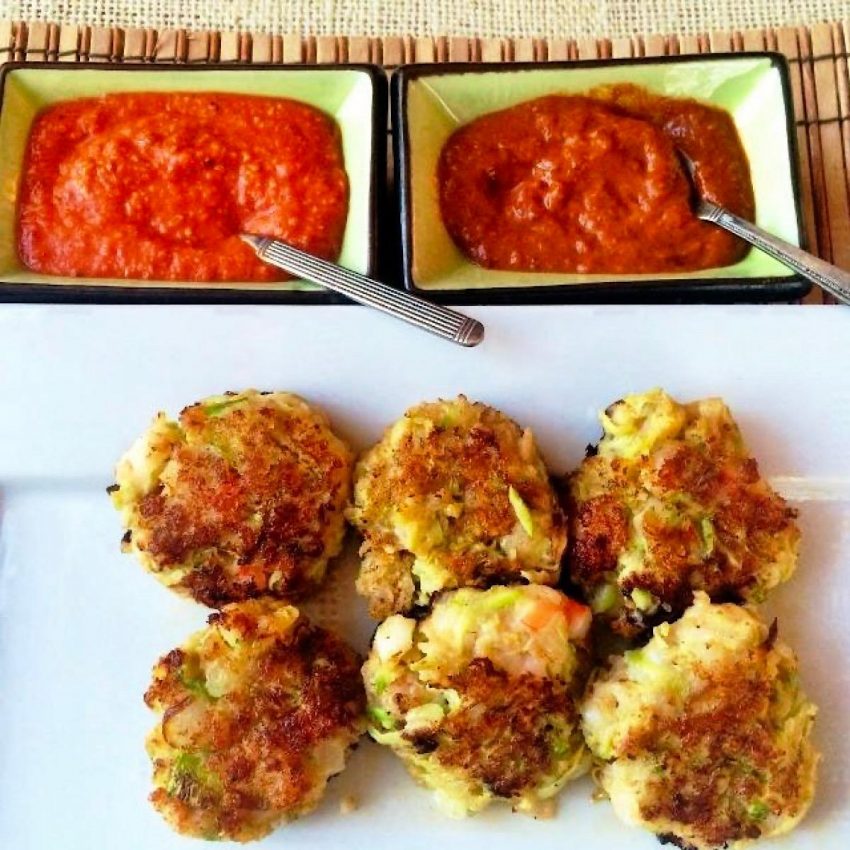 Low carb zucchini and shrimp fritters with sides of Romesco and Harissa sauces