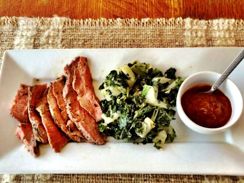 Low carb dinner of beef, bok choy and a side of harissa