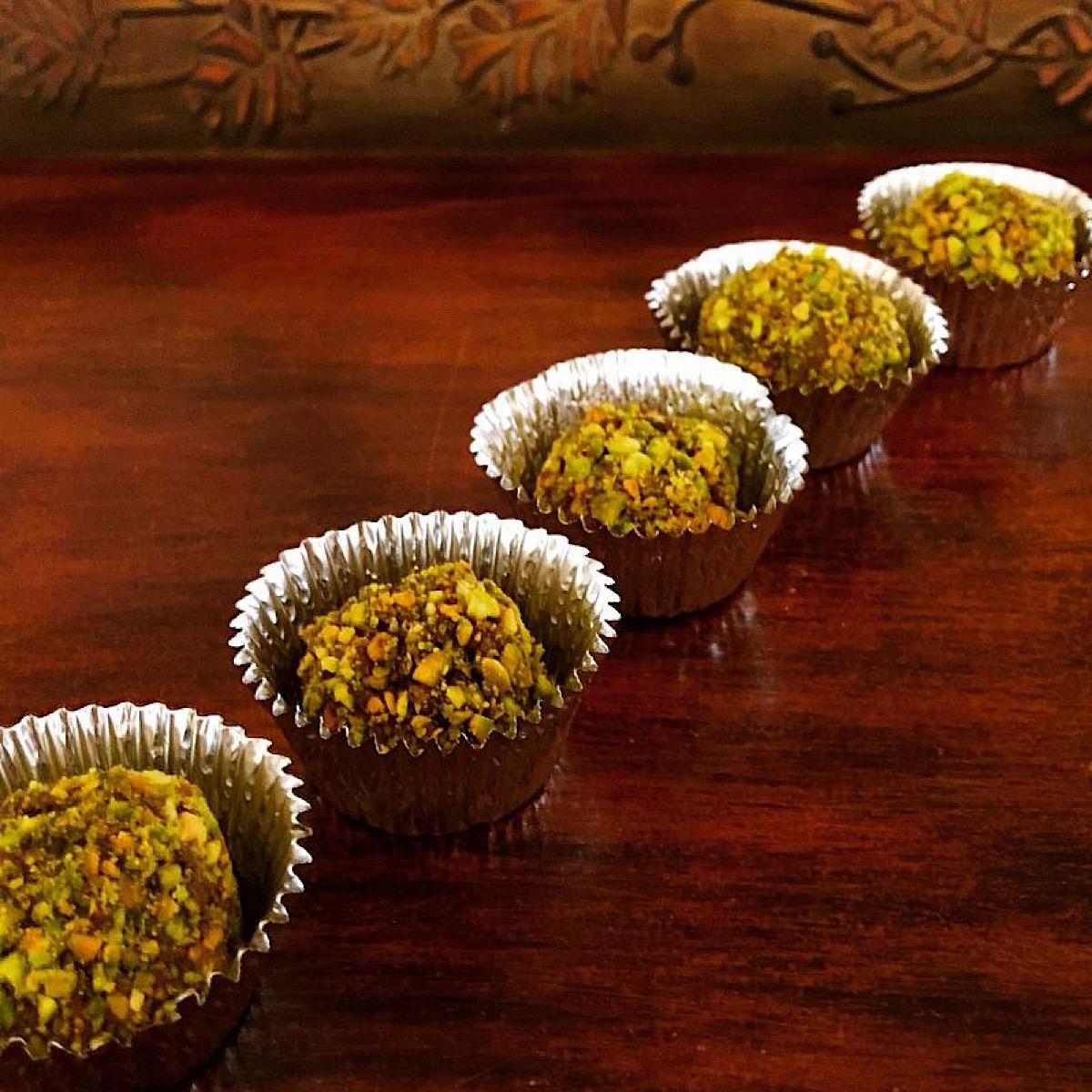 Low carb or keto chocolate truffles with pistachio coating