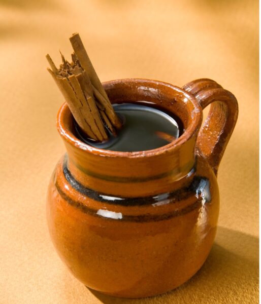 Mexican coffee with cinnamon sticks as stir sticks.