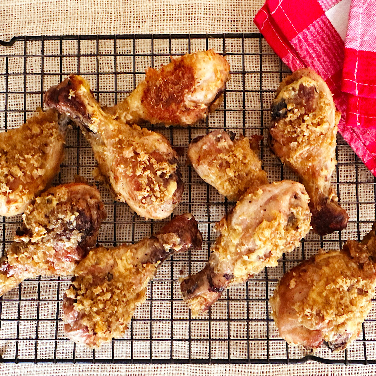 Baked chicken legs with low carb mustard and breading coating.