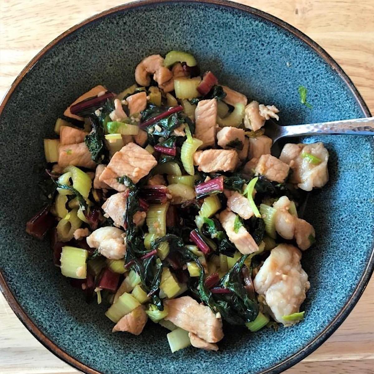 Low carb stir fry made with pork and swiss chard