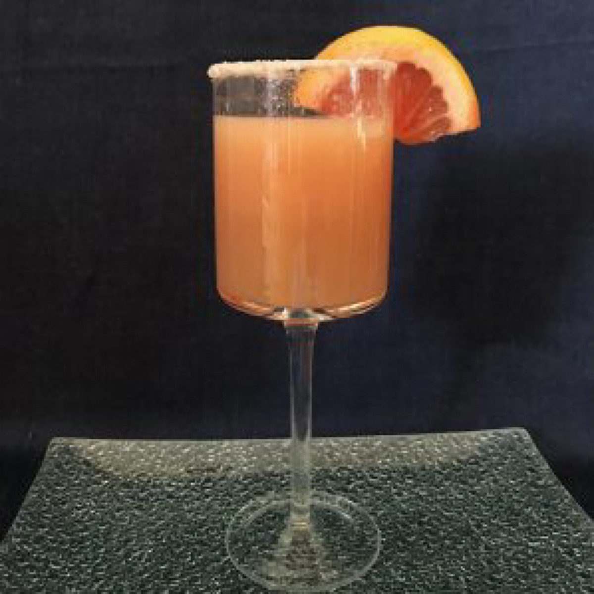 Salty dog cocktail with grapefruit shrub syrup