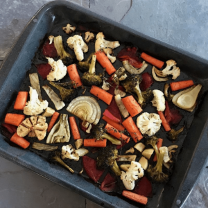 Tray of vegetables sprinkled with rhubarb vinegar