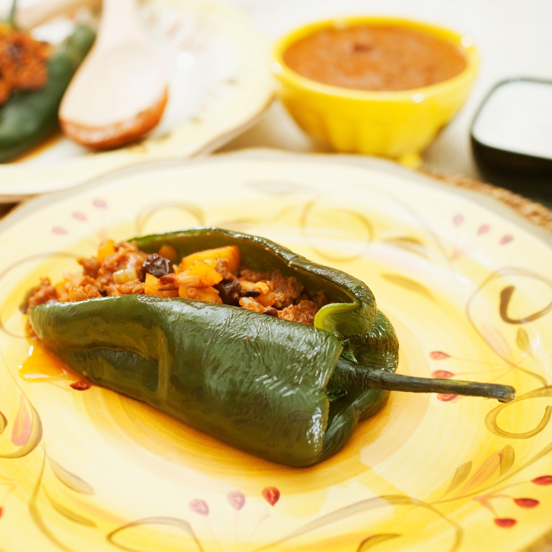 Poblanos stuffed with squash and beans.