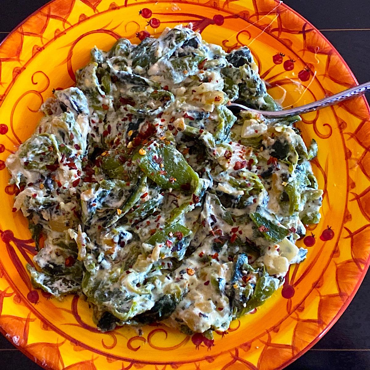 Low carb rajas poblano with cheese and sour cream in a bowl