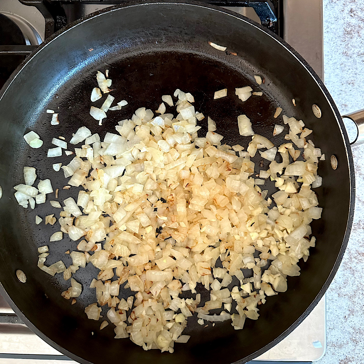 Chopped onions carmelizing in skillet