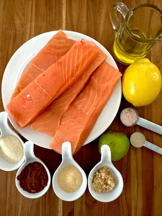 4 salmon filets and spices as ingredients for Mexican spiced salmon.