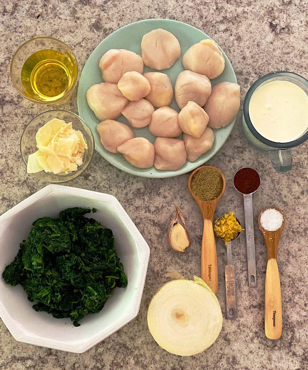 Ingredients for creamed spinach and seared scallops
