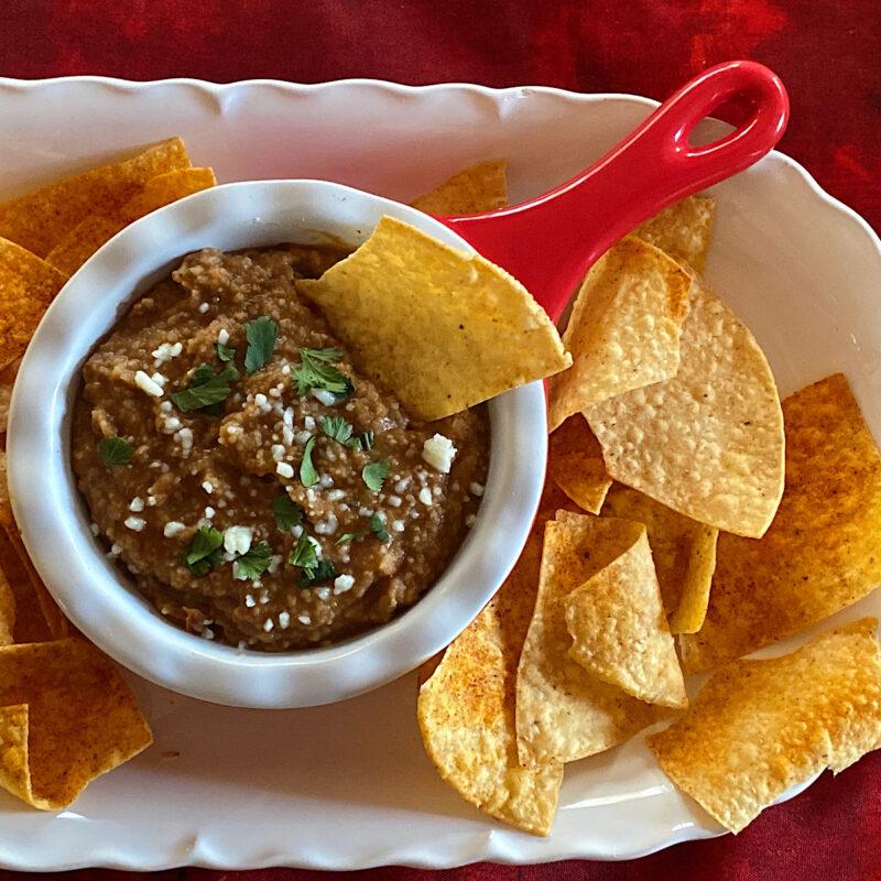 Refried bean dip with corn tortilla chips