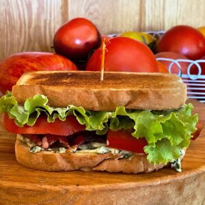 Classic BLT sandwich with basil mayonnaise and heirloom tomatoes