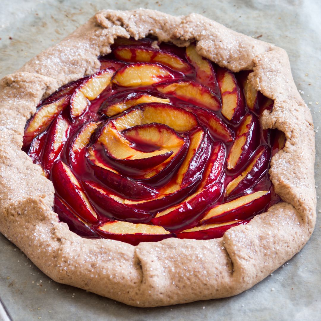 Galette (or crostata) filled with purple plums.