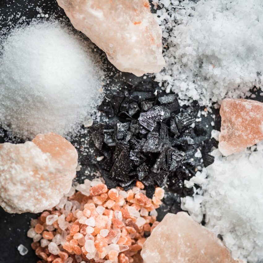 Different kinds of salt, including pink salt, black salt, kosher salt, etc.
