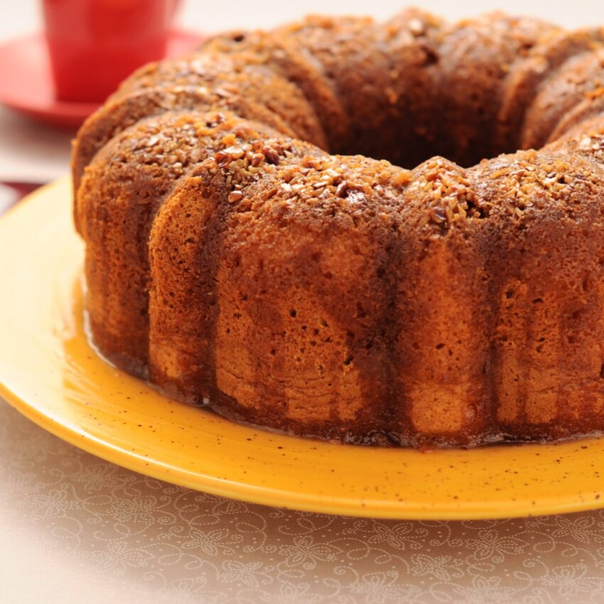 Steamed pudding in a bundt pan with a cider sauce.