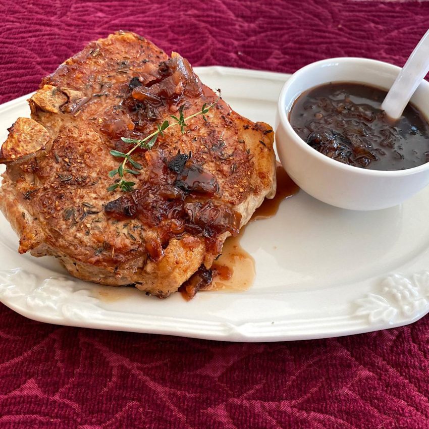 Pork chop drizzled with Cumberland Sauce