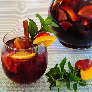 Glass and a pitcher of classic red Sangria