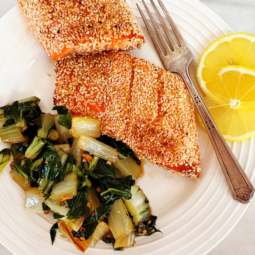 Sesame crusted salmon with a side of sautéed bok choy.