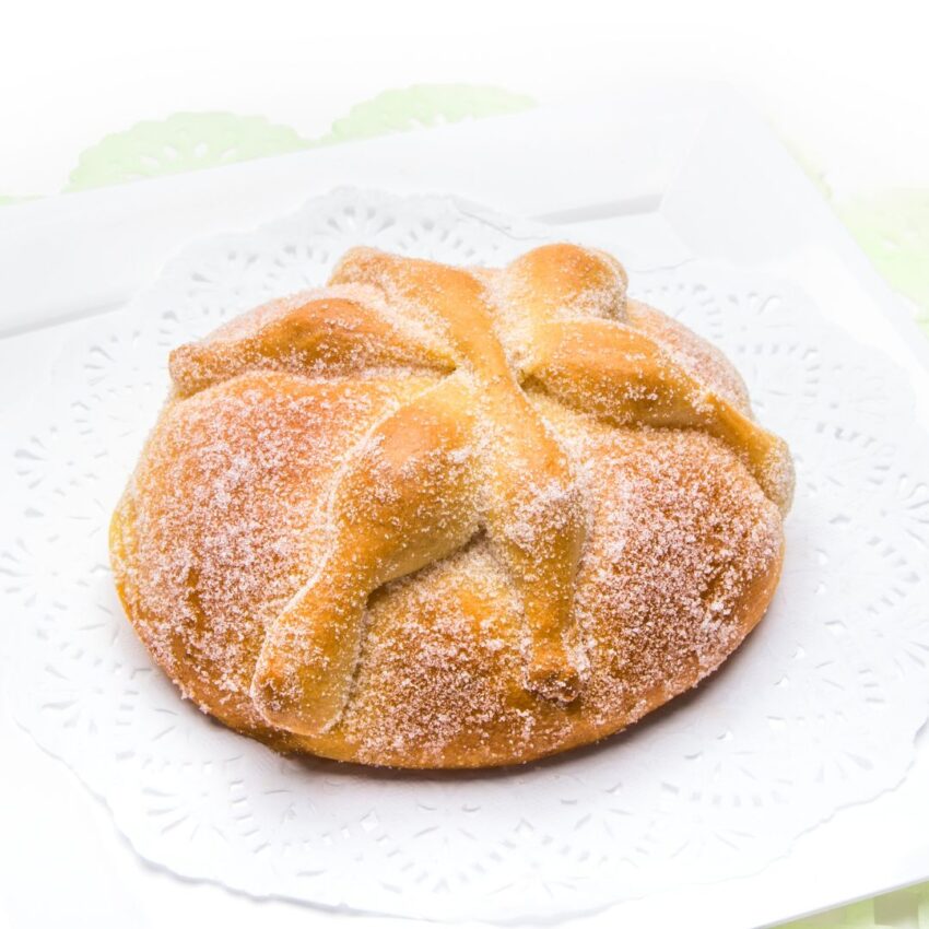 Loaf of Pan de Muerto bread made for Day of the Dead celebration.