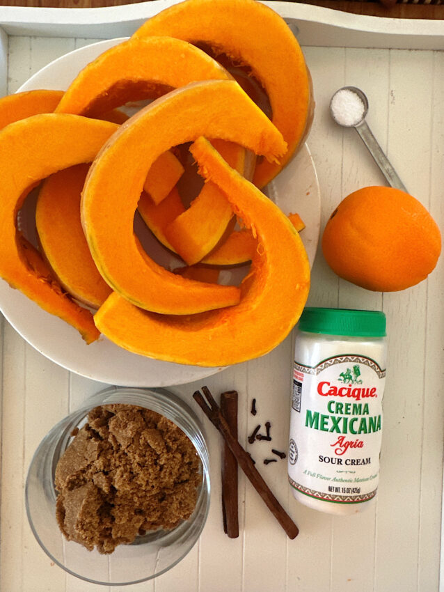 Ingredients for Mexican candied pumpkin: squash, salt, orange, crema, cinnamon and brown sugar.