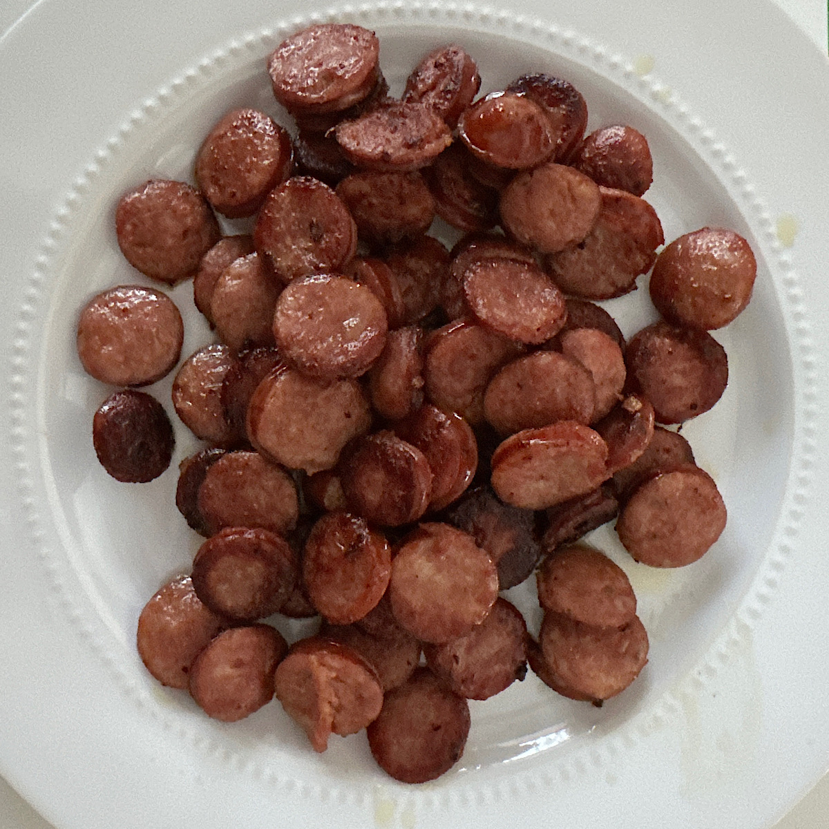 Plate of sliced andouille sausage.