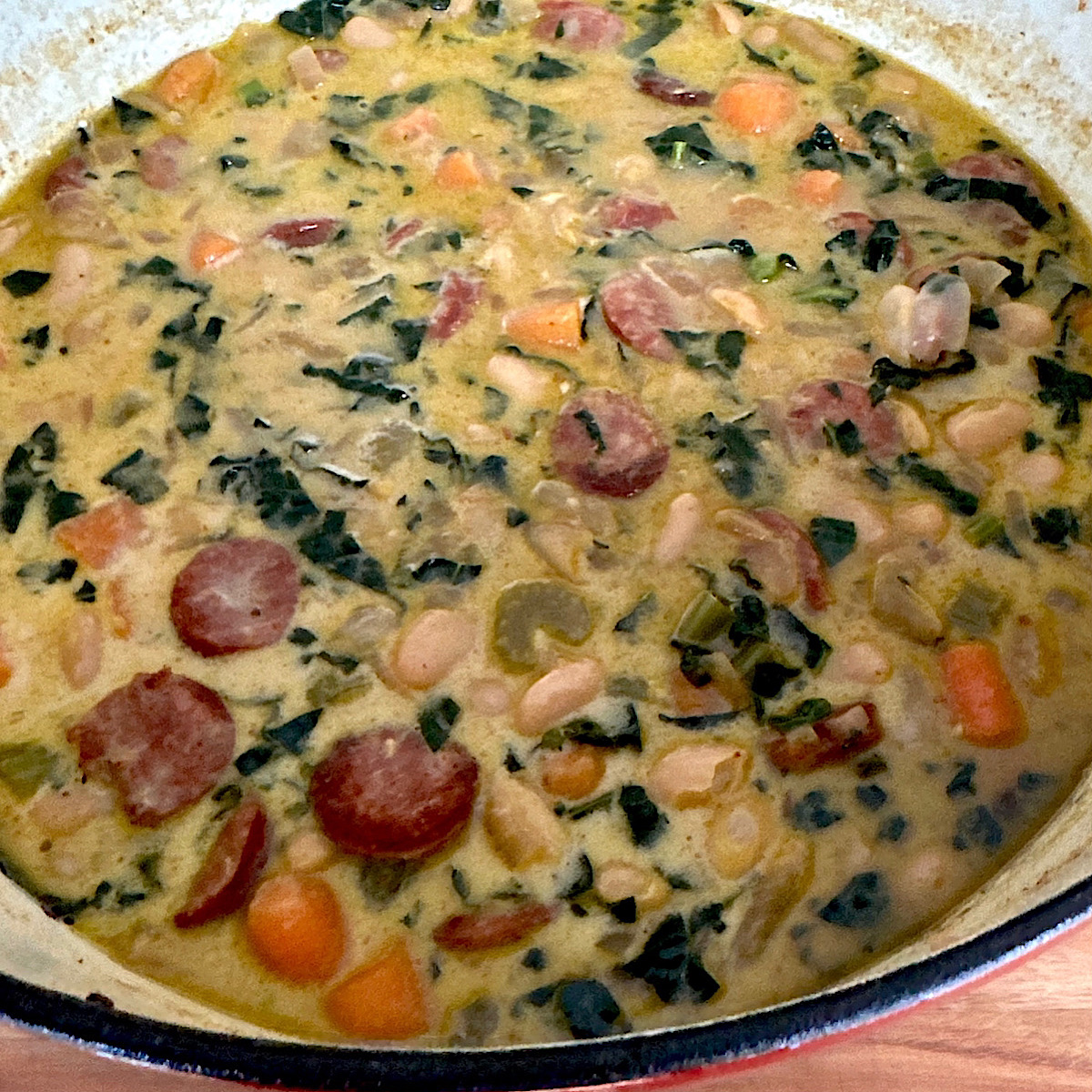 Italian bean, kale sausage stew with heavy cream added in.
