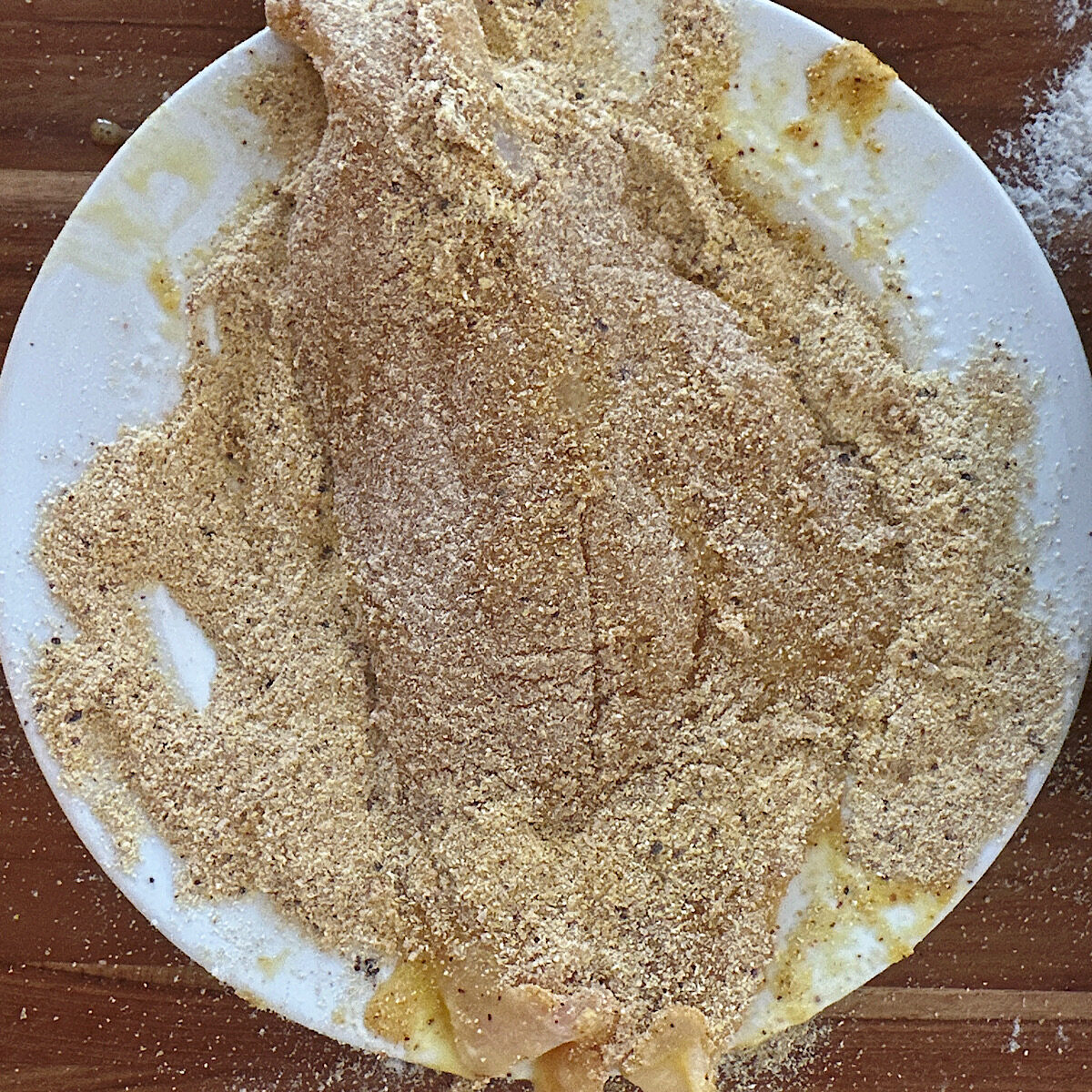 Catfish filet coated in a spicy fish seasoning blen.