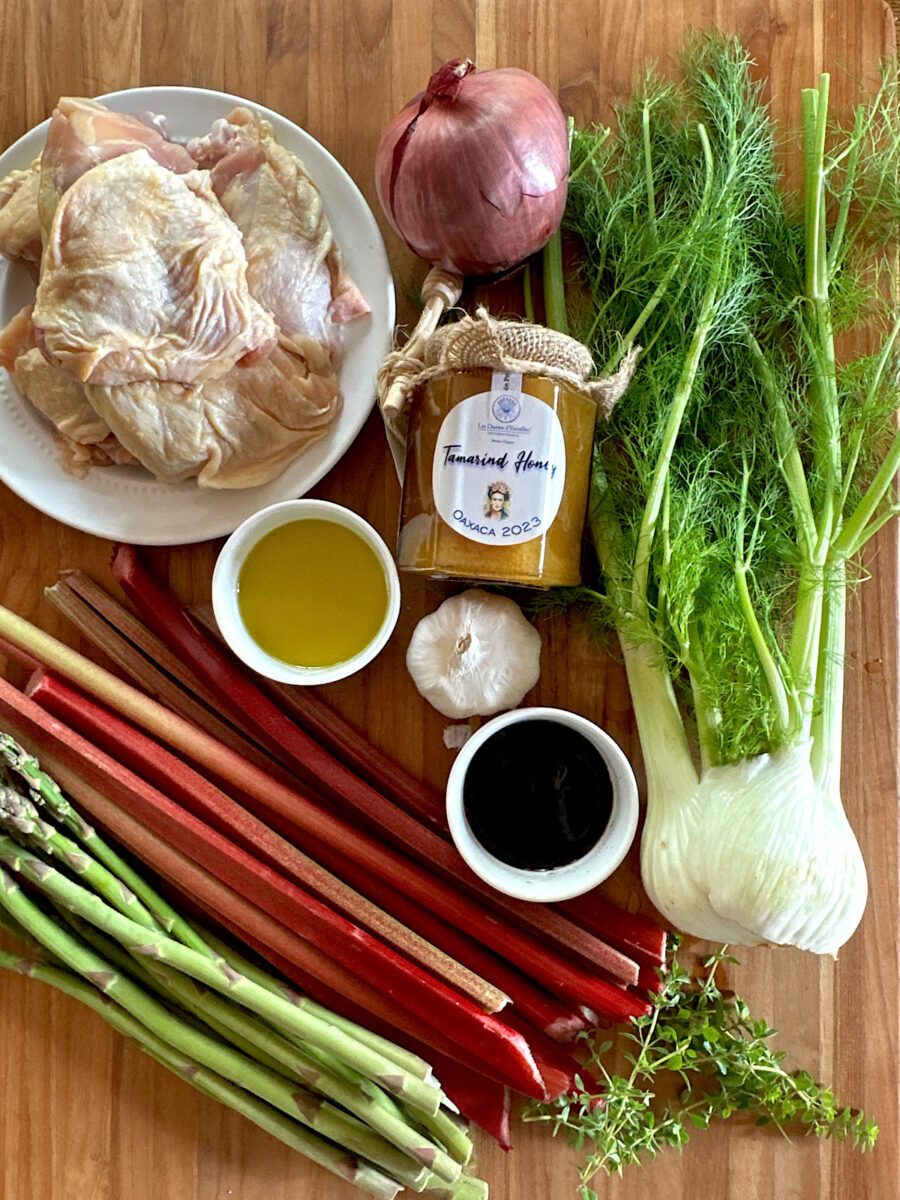 Ingredients for roasted chicken, rhubarb, asparagus  and fennel sheet pan dinner.