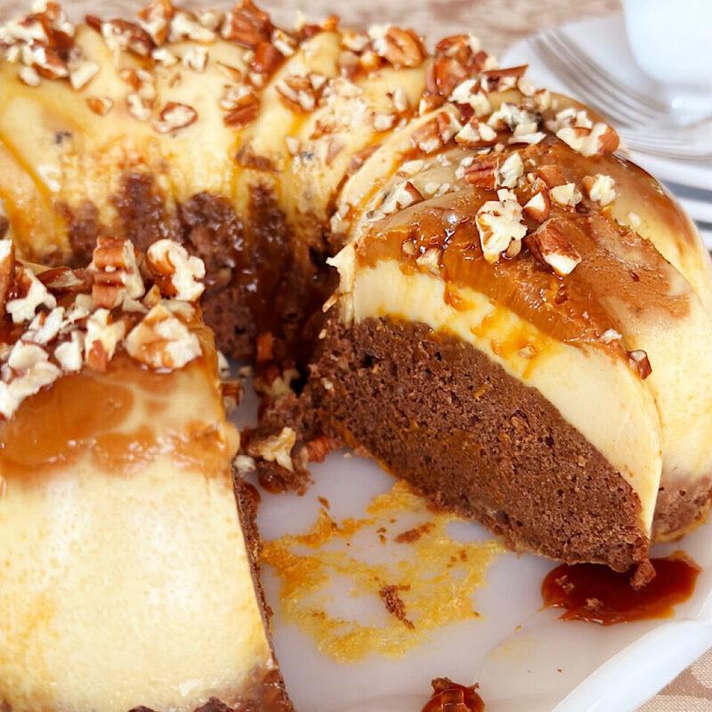 Mexican Impossible cake with slice cut out of it.