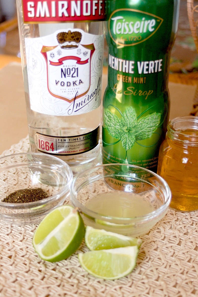 Ingredients for a mint green tea martini: vodka, mint syrup, green tea, lime juice