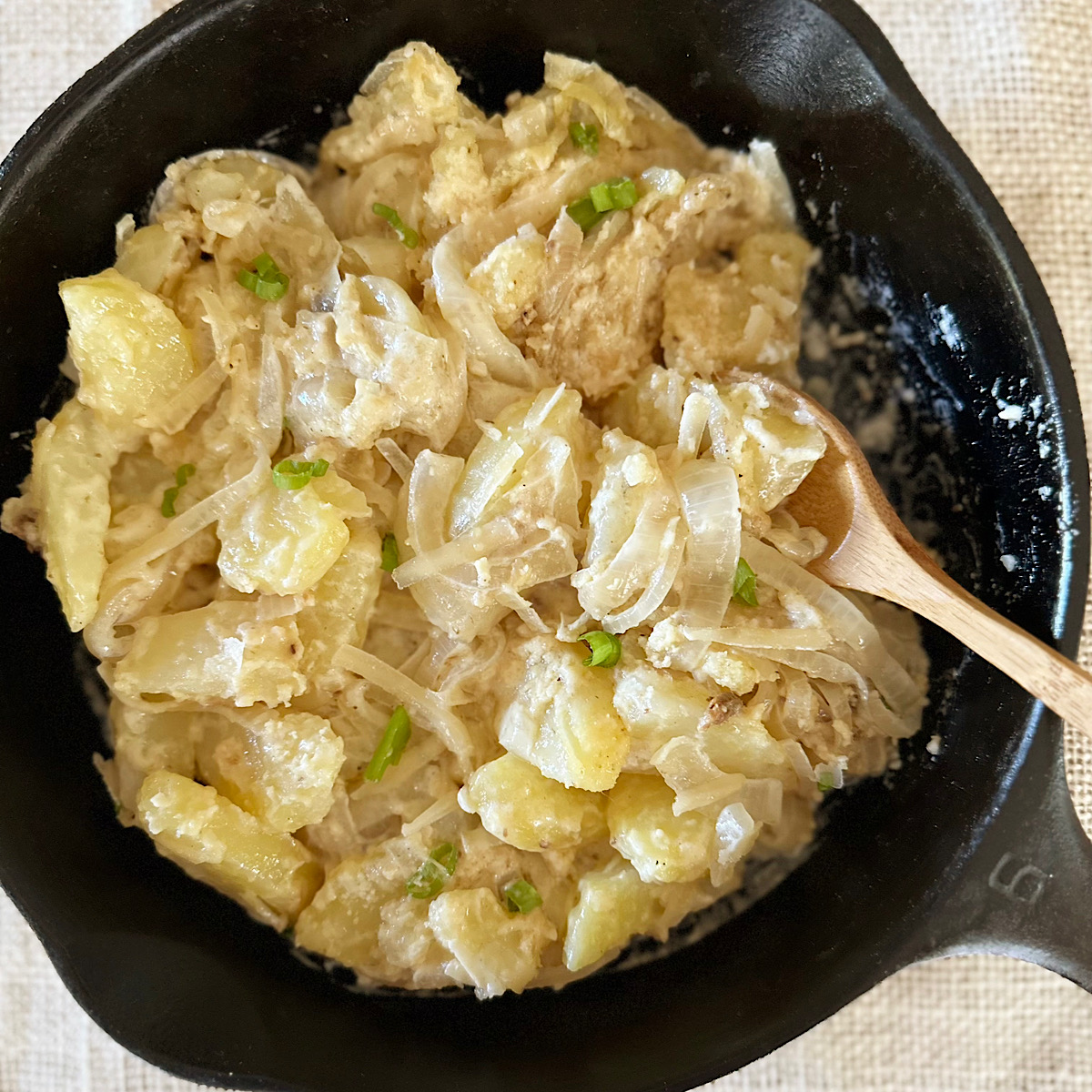 Swedish potato onion anchovy bake in a skillet