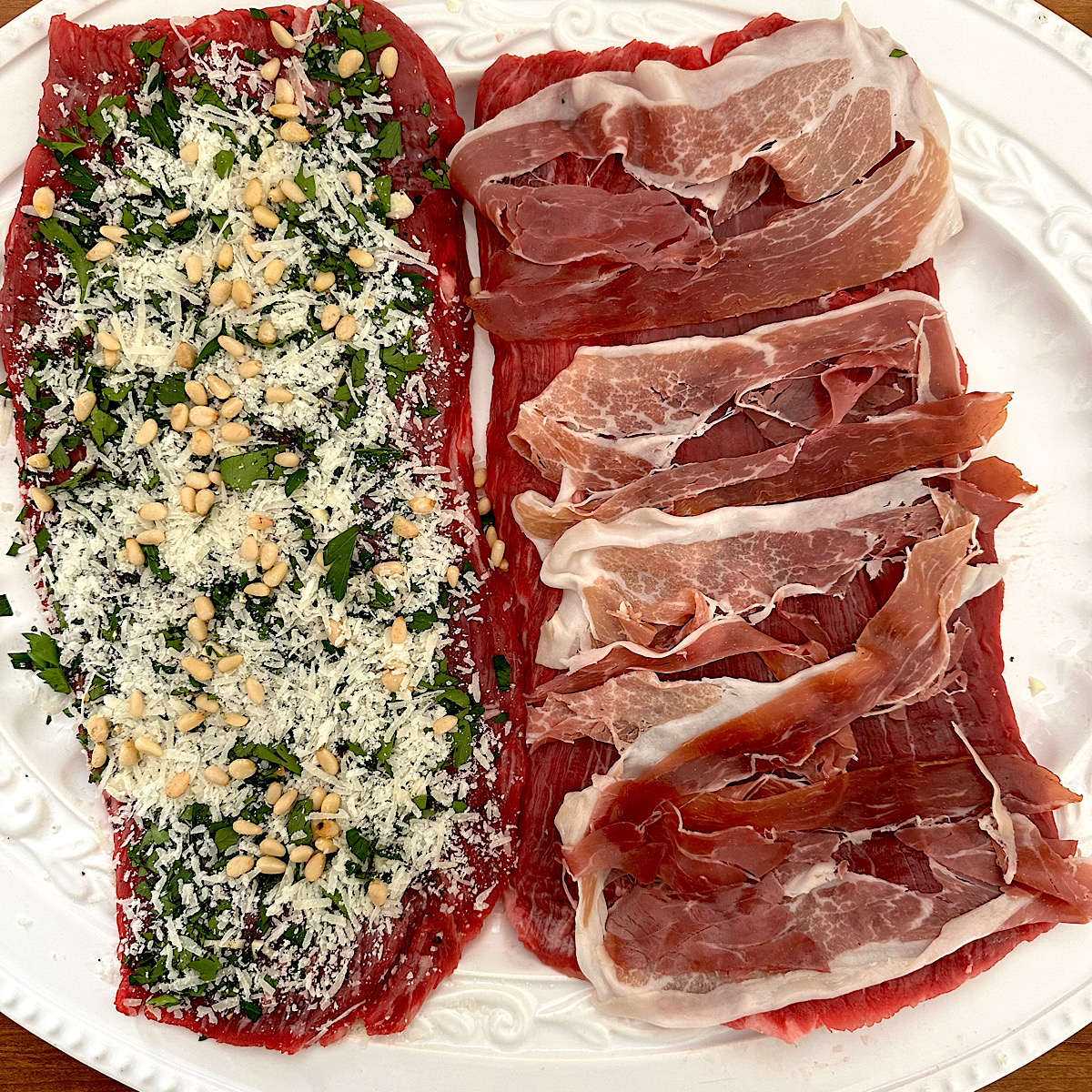 2 flank steaks, one with prosciutto layer and one with parsley-cheese-pine nut layer