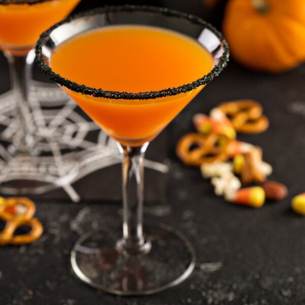 Halloween pumpkin martini with black salt rim