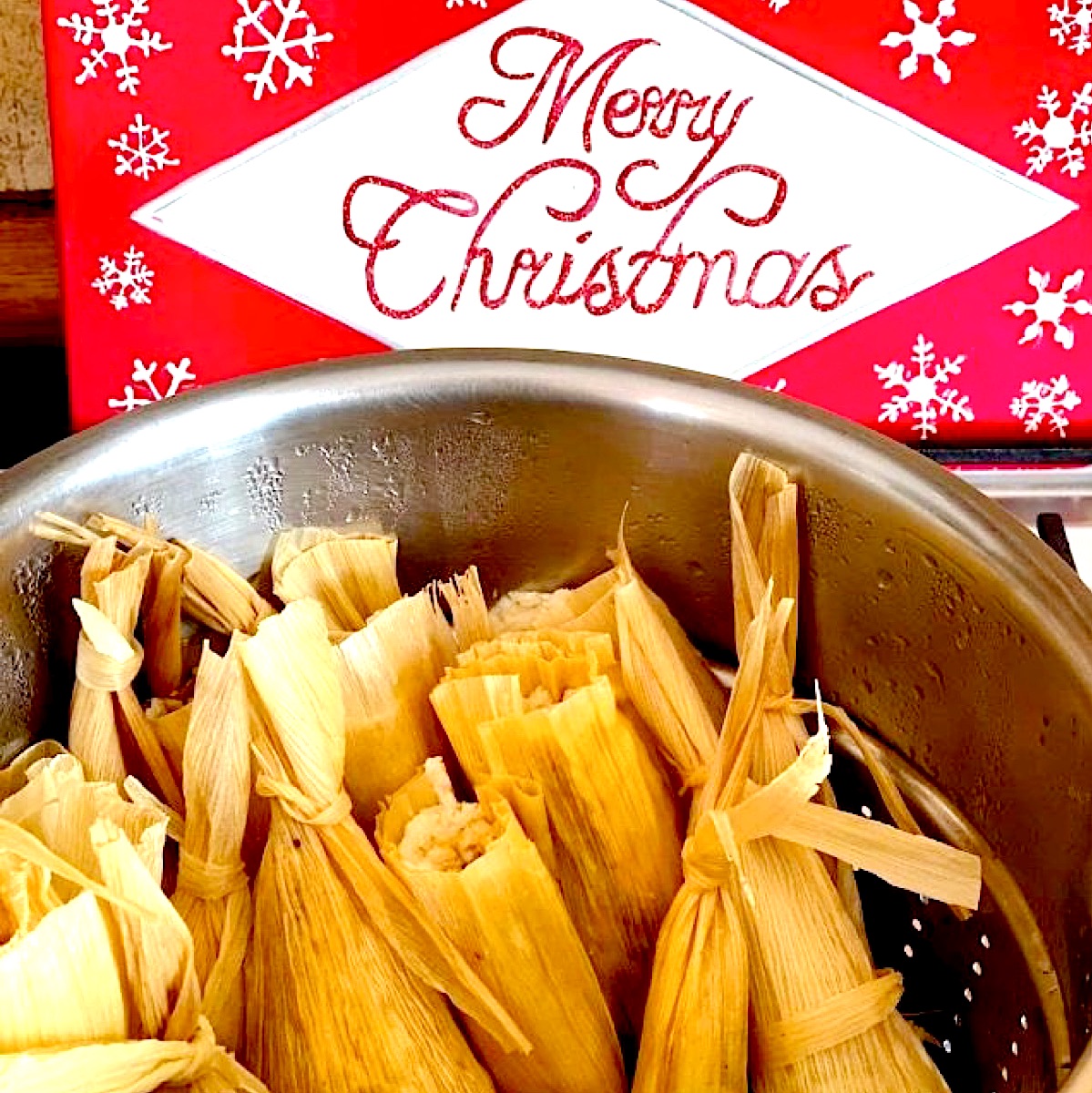 Christmas tamales in the steamer pot.