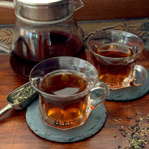 Hibiscus mate brewed tea and looseleaf from Dorothy Stainbrook's Wellness tea collection