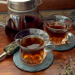 Hibiscus mate brewed tea and looseleaf from Dorothy Stainbrook's Wellness tea collection
