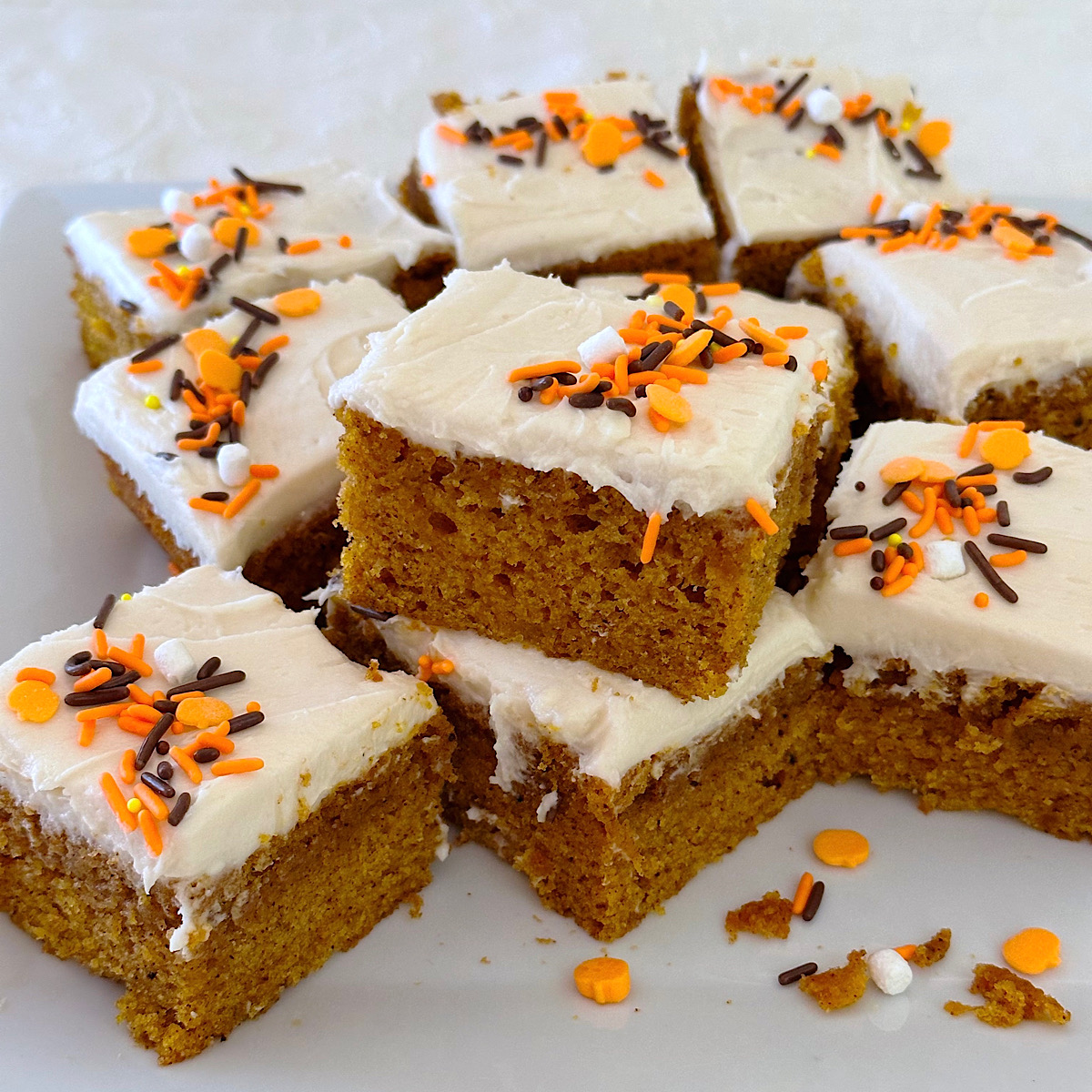 Pumpkin bars with cheesecake frosting.