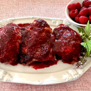 Raspberry chipotle glazed chicken thighs.