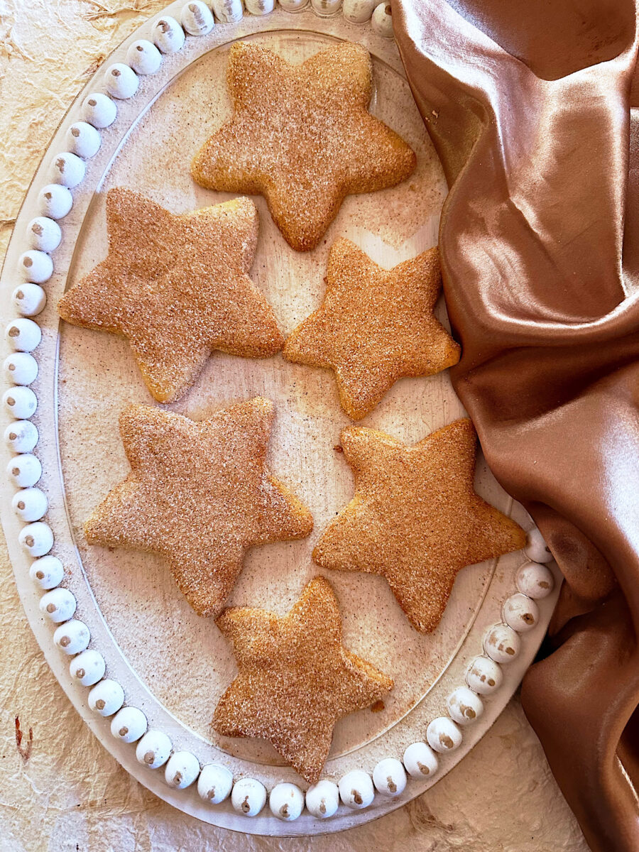 Mexican shortbread cookies: Bizcochitos on a white plate